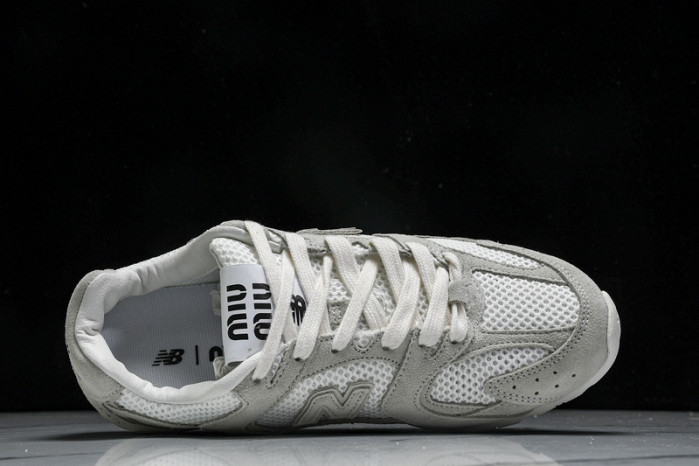 New Balance Mi­u